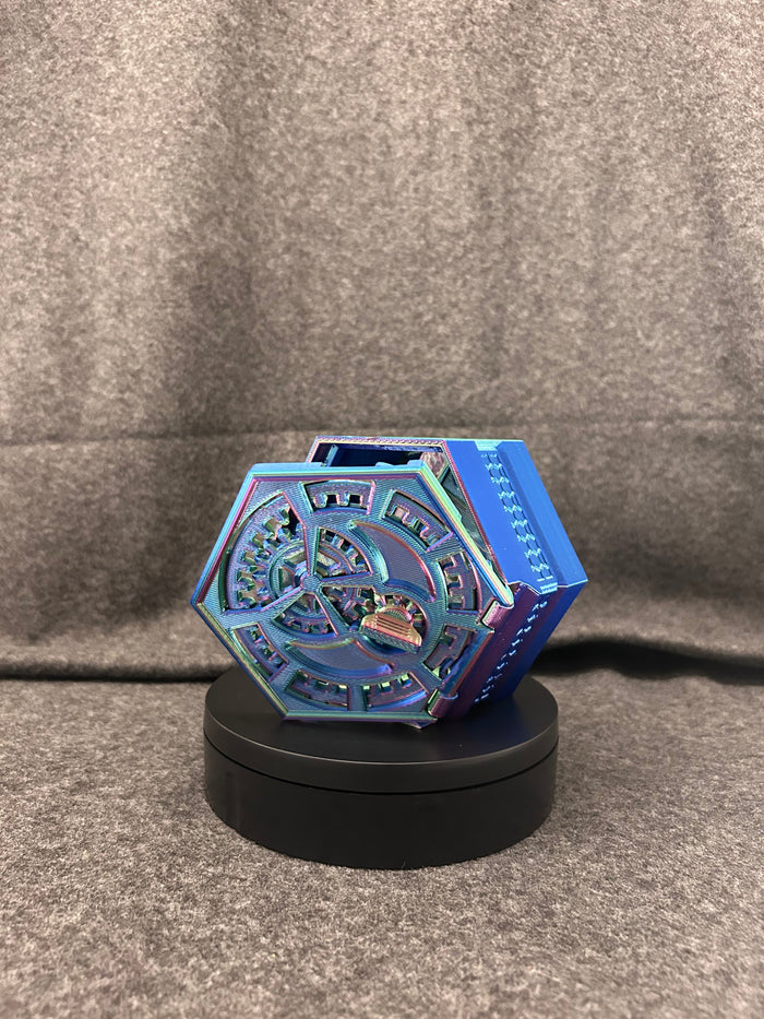 The Twentieth dice box closed, showing the numbered faceted faces.