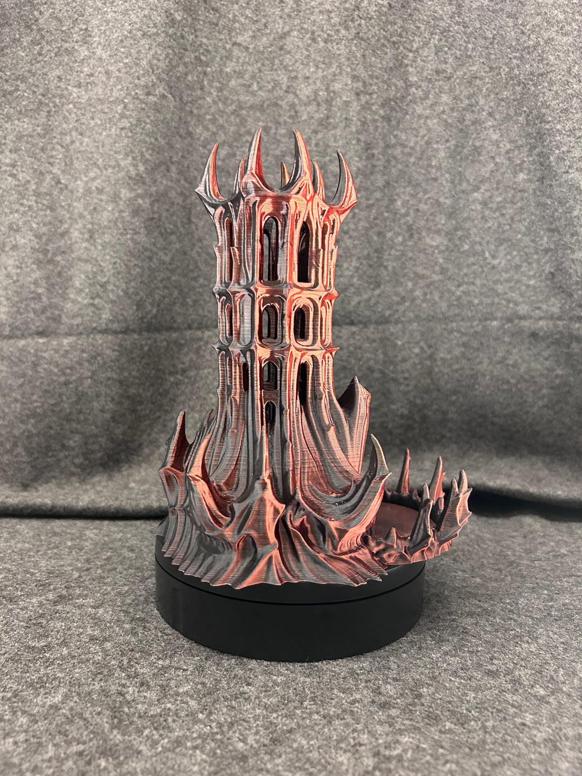 Close view of the pierced stonework and painted verdigris on the gothic dice tower.