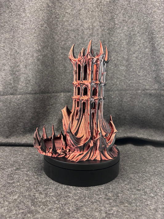 Hand-painted gothic dice tower with pierced arch windows and a crown of finials, finished in aged copper.