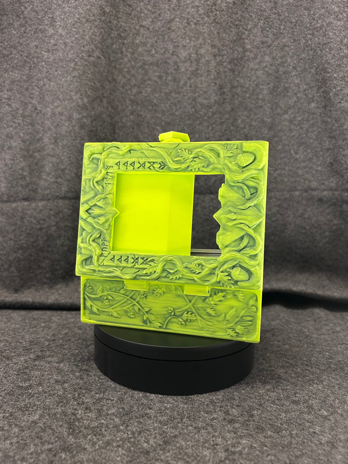 Side view of the Verdant Codex showing the printed hinge and latch.