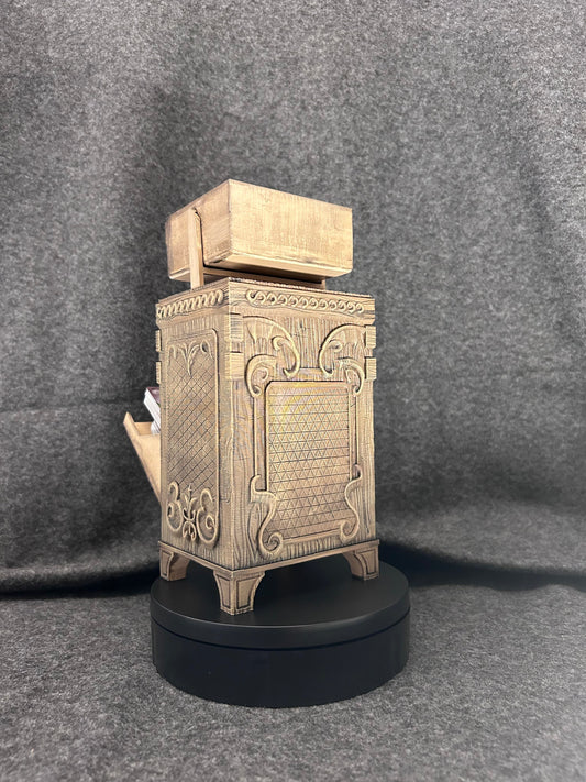 Front view of the deck chest showing the relief face worked into the panel.
