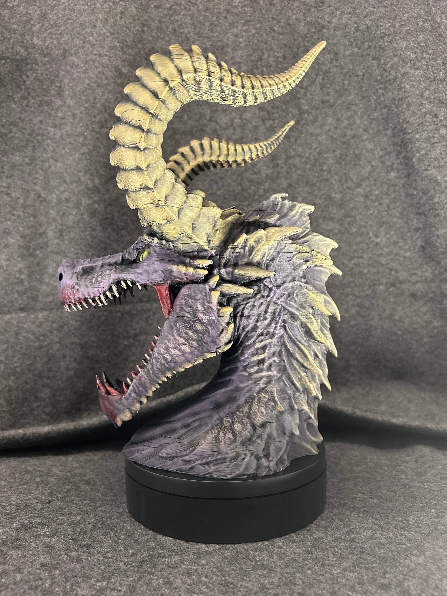 Three-quarter view of the Duskmaw dragon controller and headphone stand.