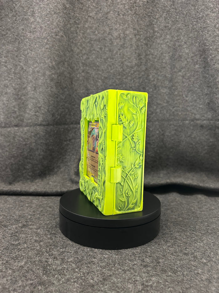 The Verdant Codex card case closed, showing the raised vine pattern across the lid.